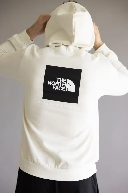 The North Face Evolution Box Logo Hoodie for Men in White Dune | NF0A8CWP-QLI sold by Glik’s