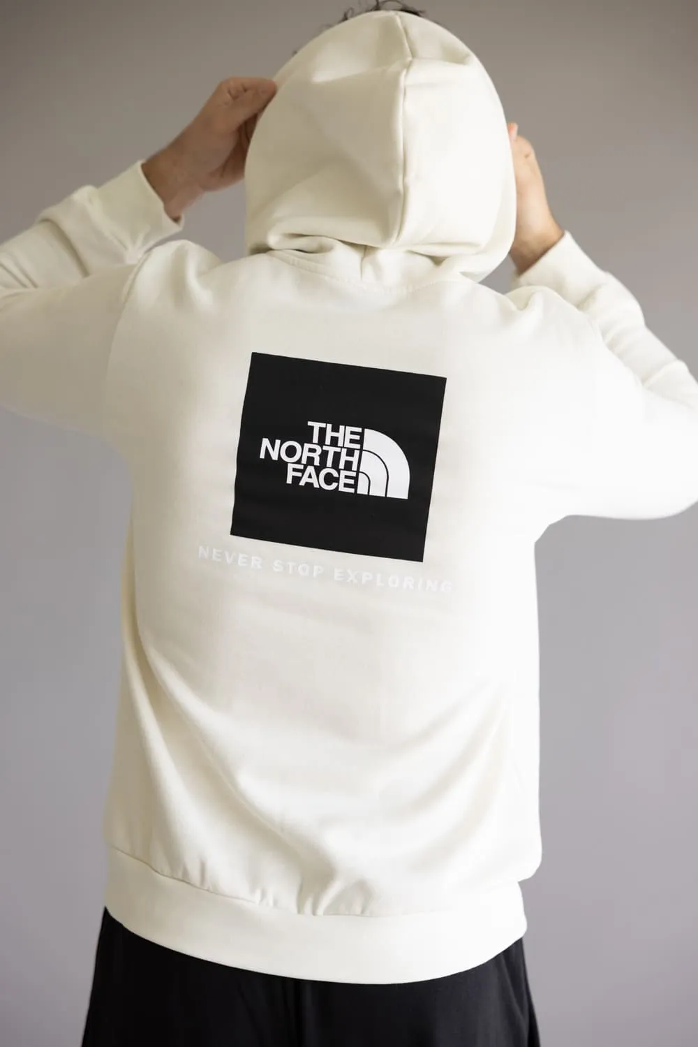 The North Face Evolution Box Logo Hoodie for Men in White Dune | NF0A8CWP-QLI sold by Glik’s
