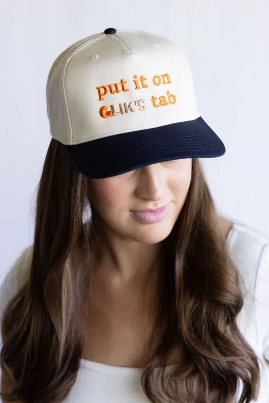 Put It On Gliks Tab Trucker Hat for Women in Navy/Tan | KDC-BC-1171-NVY-TAN sold by Glik’s