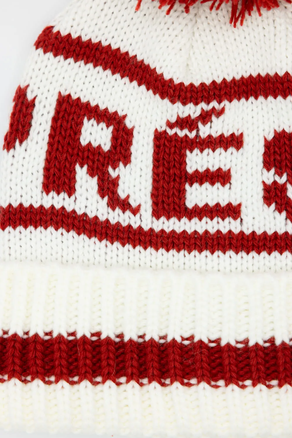 C.C. Apres Ski Yarn Pom Beanie for Women in Ivory/Red | HTE0134IVY sold by Glik’s product image thumbnail 2