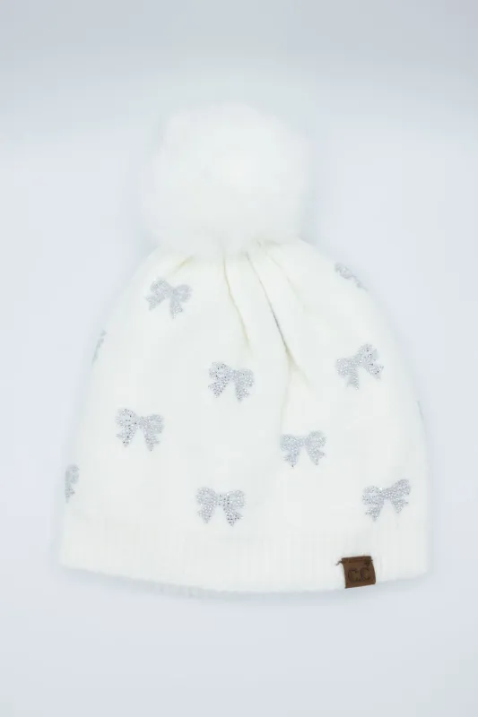 C.C. Bow Rhinestone Pom Beanie for Women in White | HTE0136-IVY sold by Glik’s