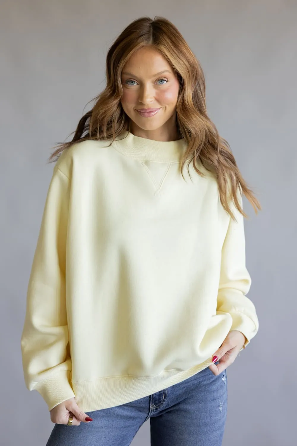 Things Between Mock Neck Fleece Pullover for Women sold by Glik’s