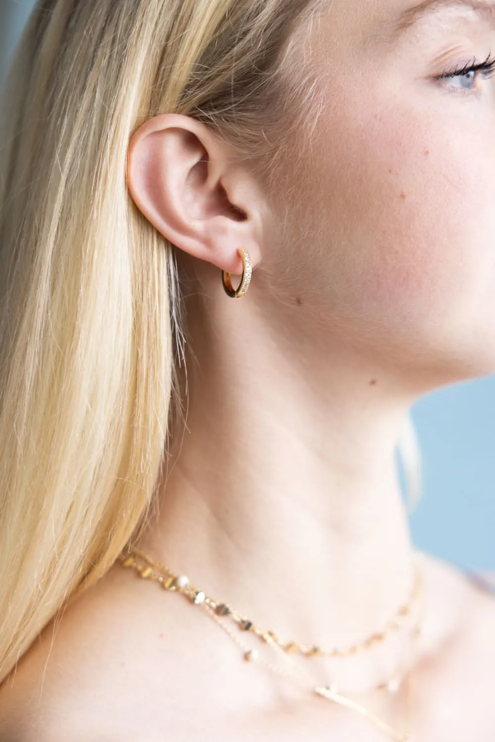 Cubic Zirconia Huggie Hoop Earrings for Women in Gold | SJE310506GLD sold by Glik’s