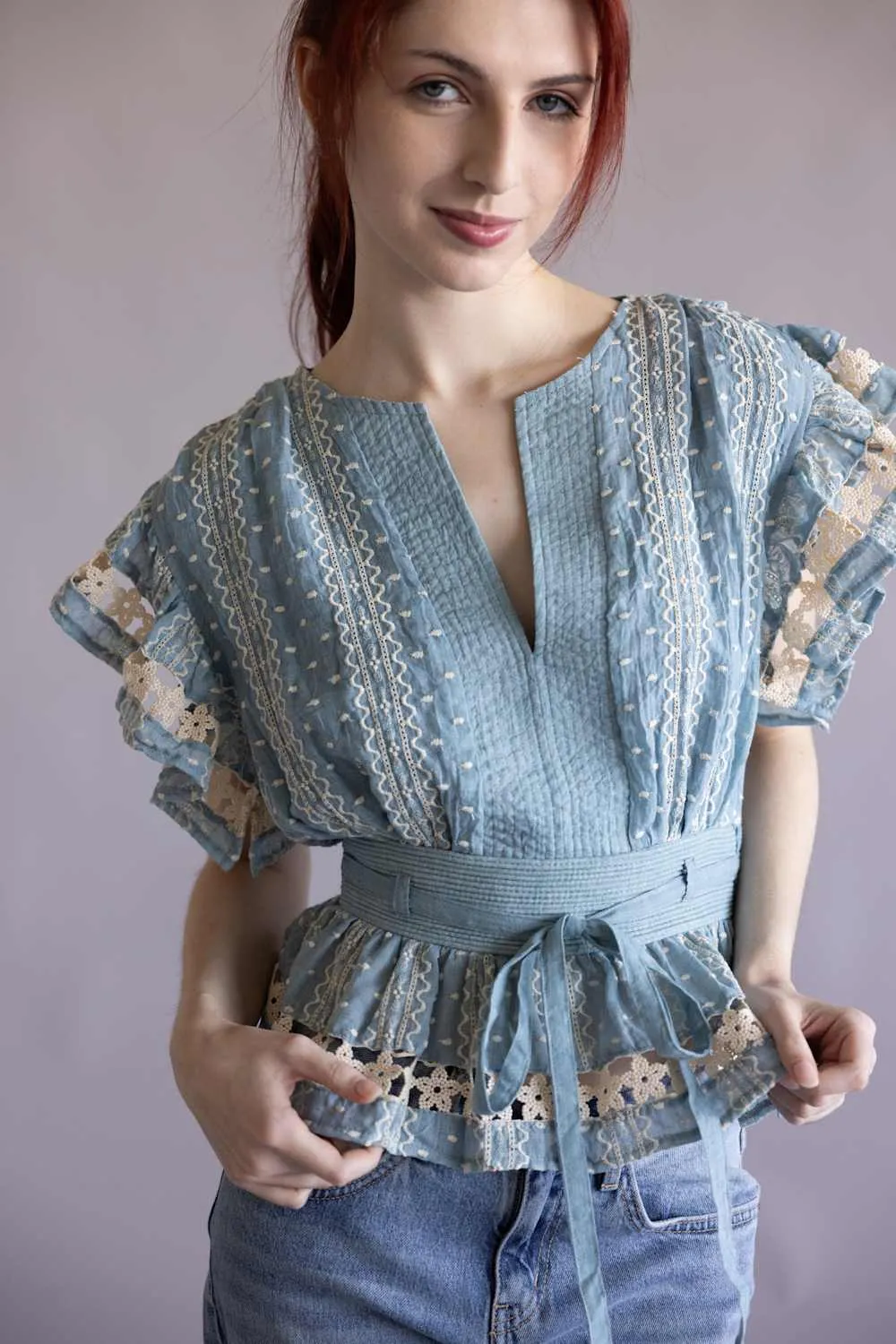 Embroidered Flutter Sleeve Peplum Top for Women in Chambray | T-50742-H-CHM sold by Glik’s product image thumbnail 4