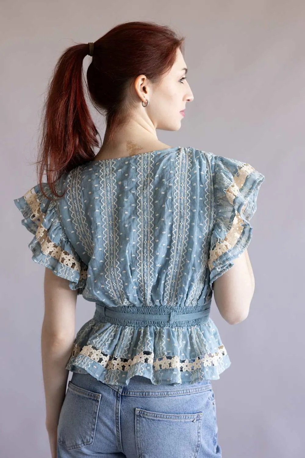 Embroidered Flutter Sleeve Peplum Top for Women in Chambray | T-50742-H-CHM sold by Glik’s product image thumbnail 3