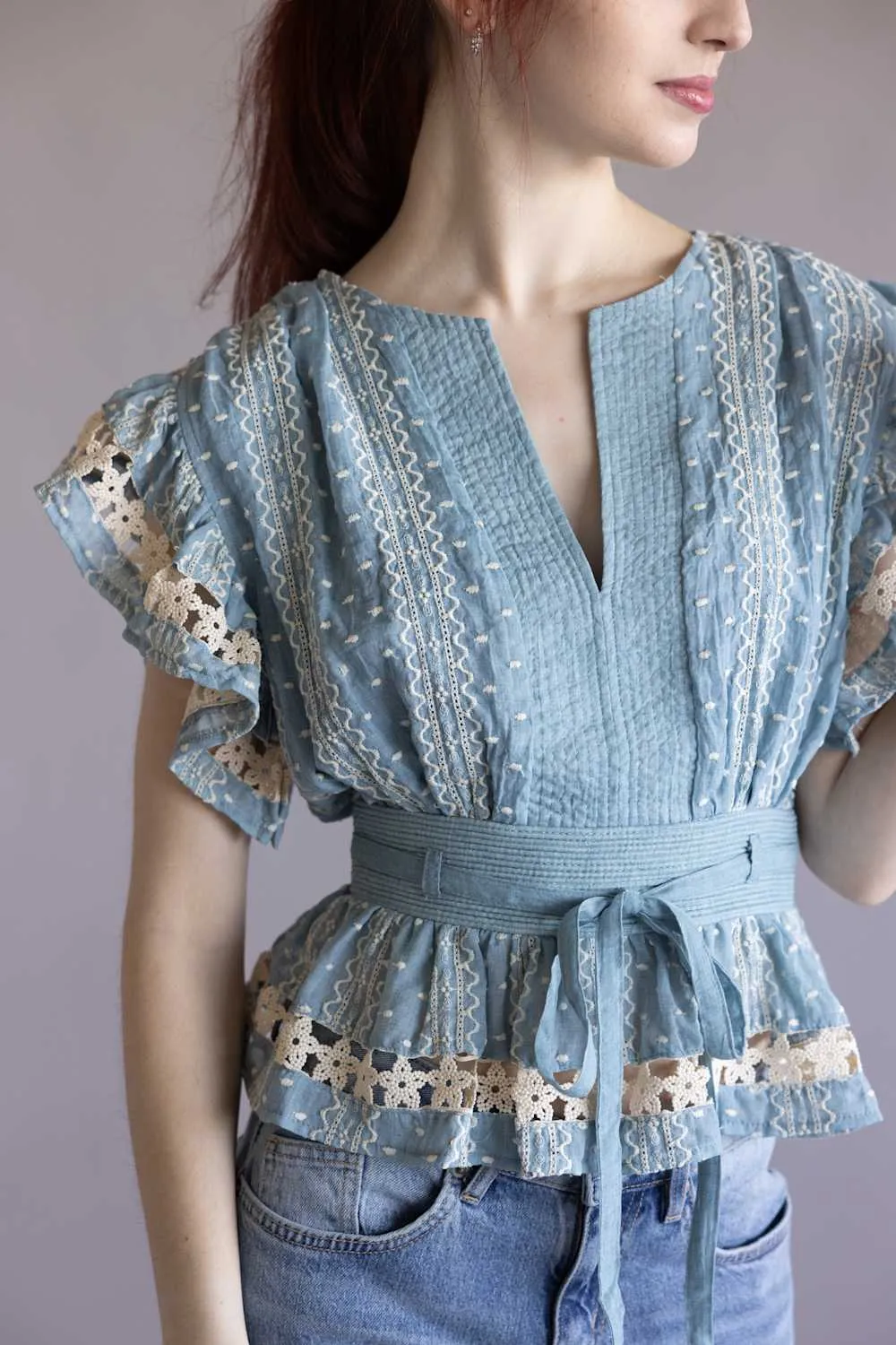 Embroidered Flutter Sleeve Peplum Top for Women in Chambray | T-50742-H-CHM sold by Glik’s product image thumbnail 5