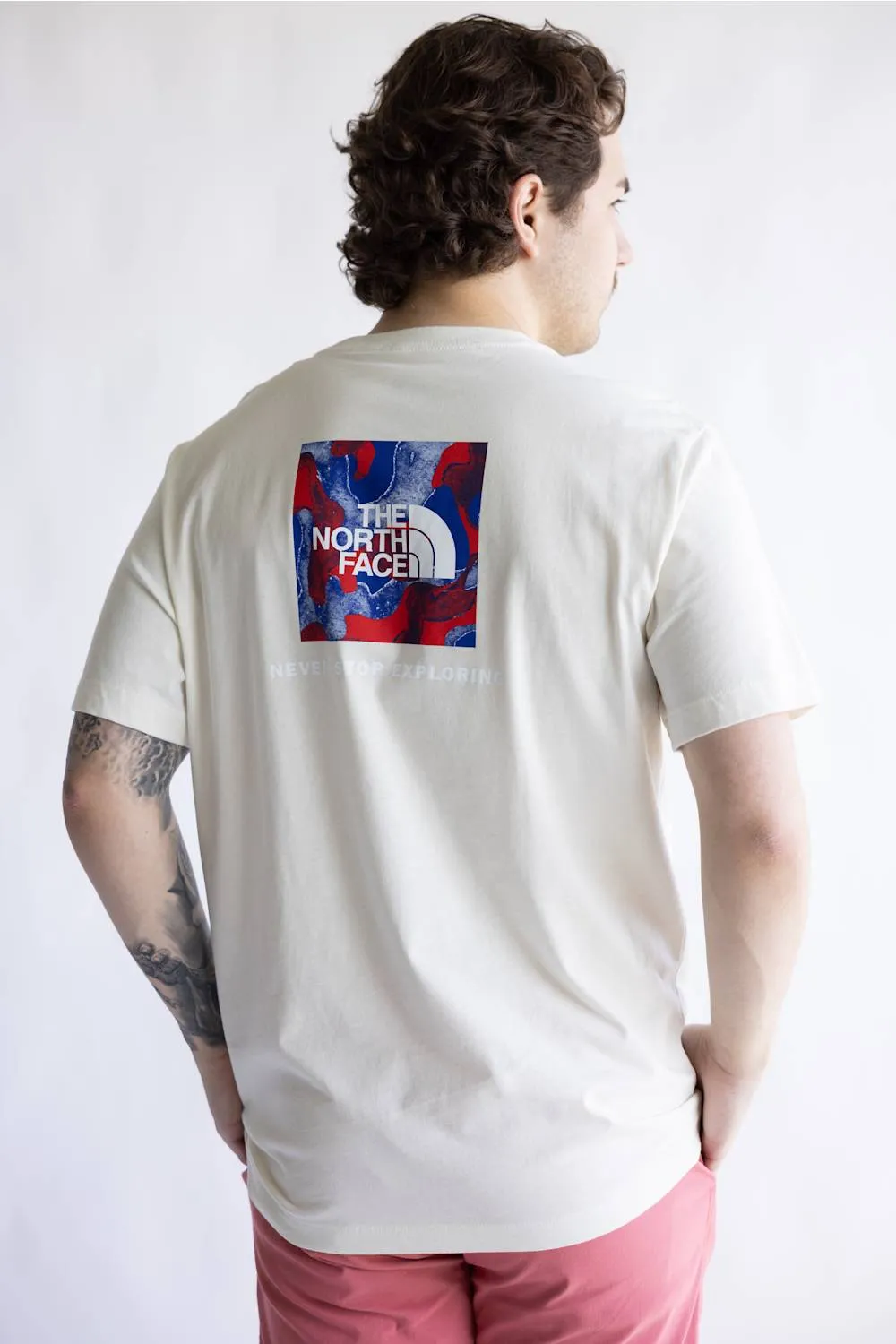 The North Face Red White & Blue Tee for Men in White Dune | NF0A8GPQ-QLI sold by Glik’s