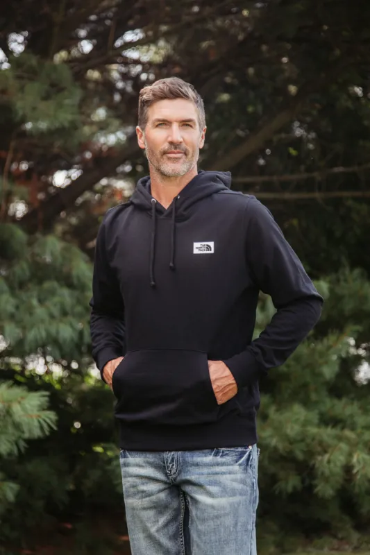 The North Face Heritage Patch Hoodie for Men in Black | NF0A7UNU-JK3 BLACK sold by Glik’s