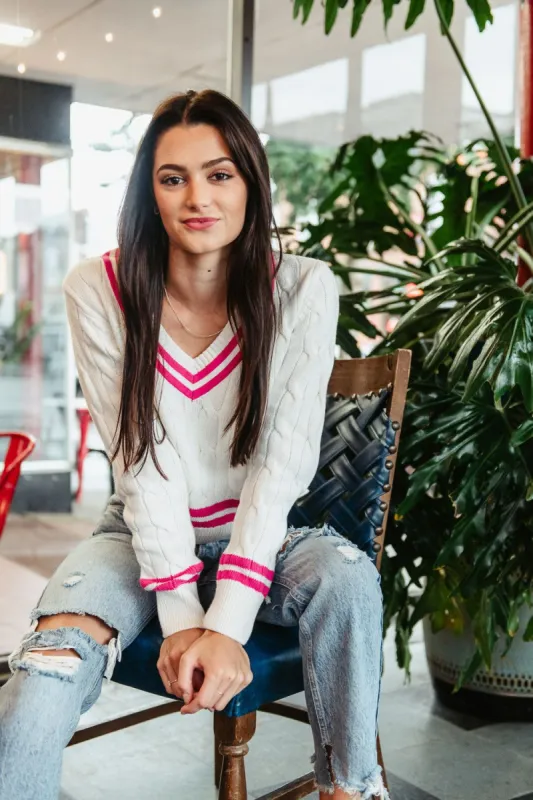 Olivaceous Pickleball V-Neck Sweater for Women in White/Pink | 2300-116LTL-WHITEFUCHSIA sold by Glik’s