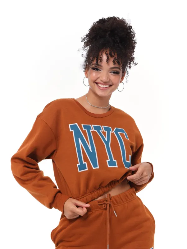 Ladies Cropped Elasticated Applique Active Top - Brown sold by Edgars