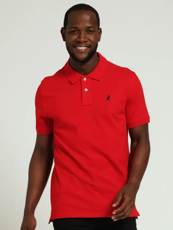 Core Carter Pique Golfer - Red sold by Edgars 