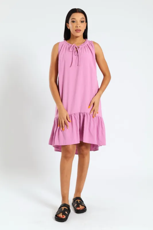 Sleeveless Frill Neck Drop Hem Dress - Mauve sold by Edgars