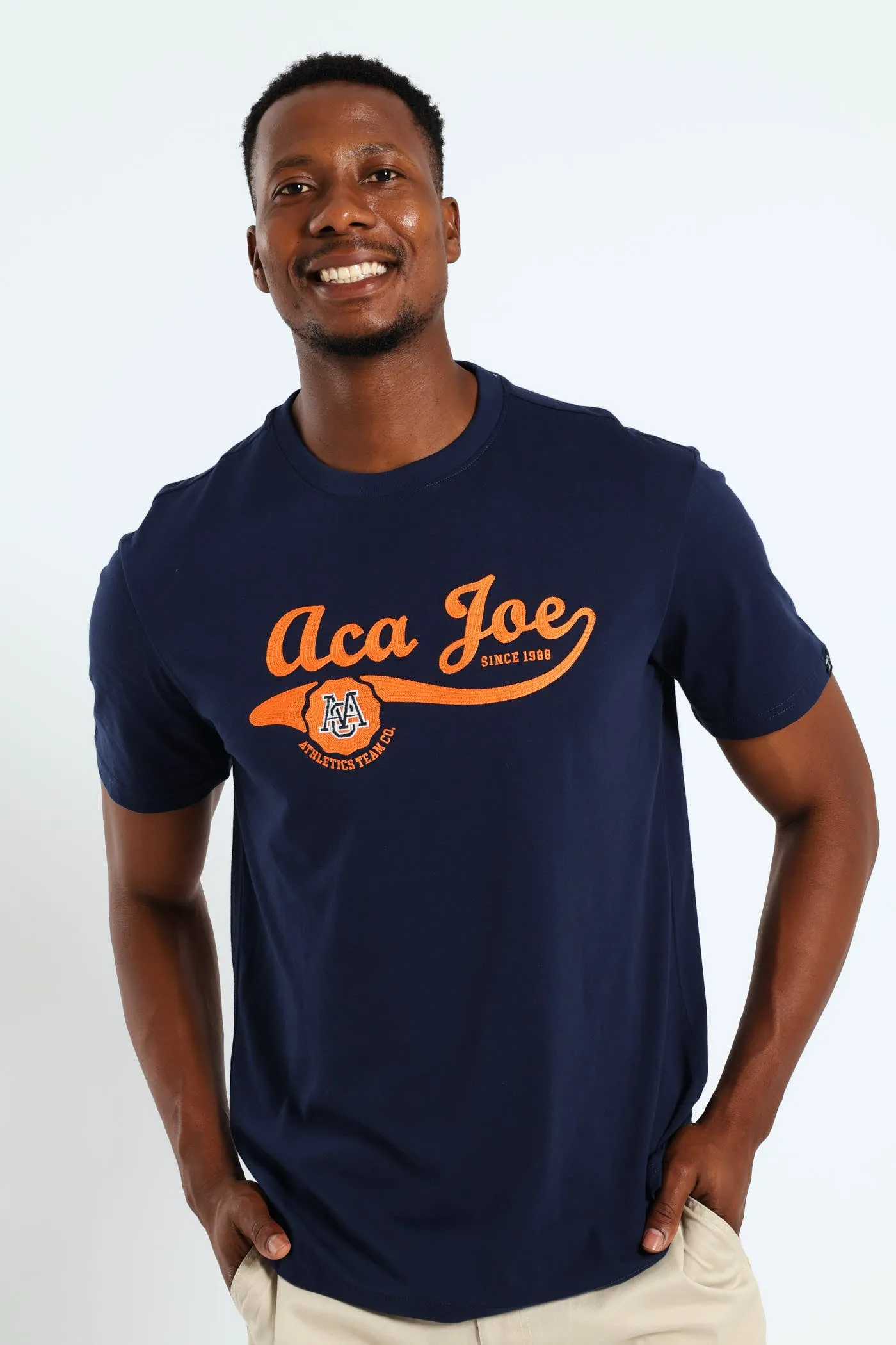 Tail Logo Embroidered Tee - Navy sold by Edgars