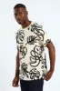 Tropical Spray Allover Print Tee - Off White sold by Edgars 