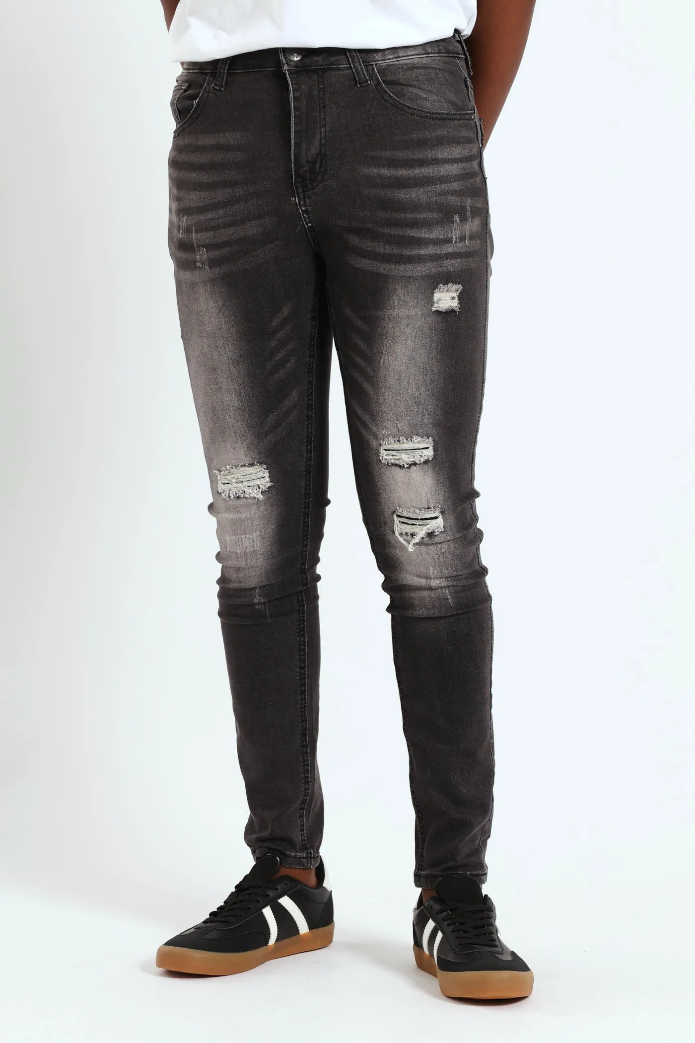 Rip & Repair Knee Skinny Denim - Black sold by Edgars