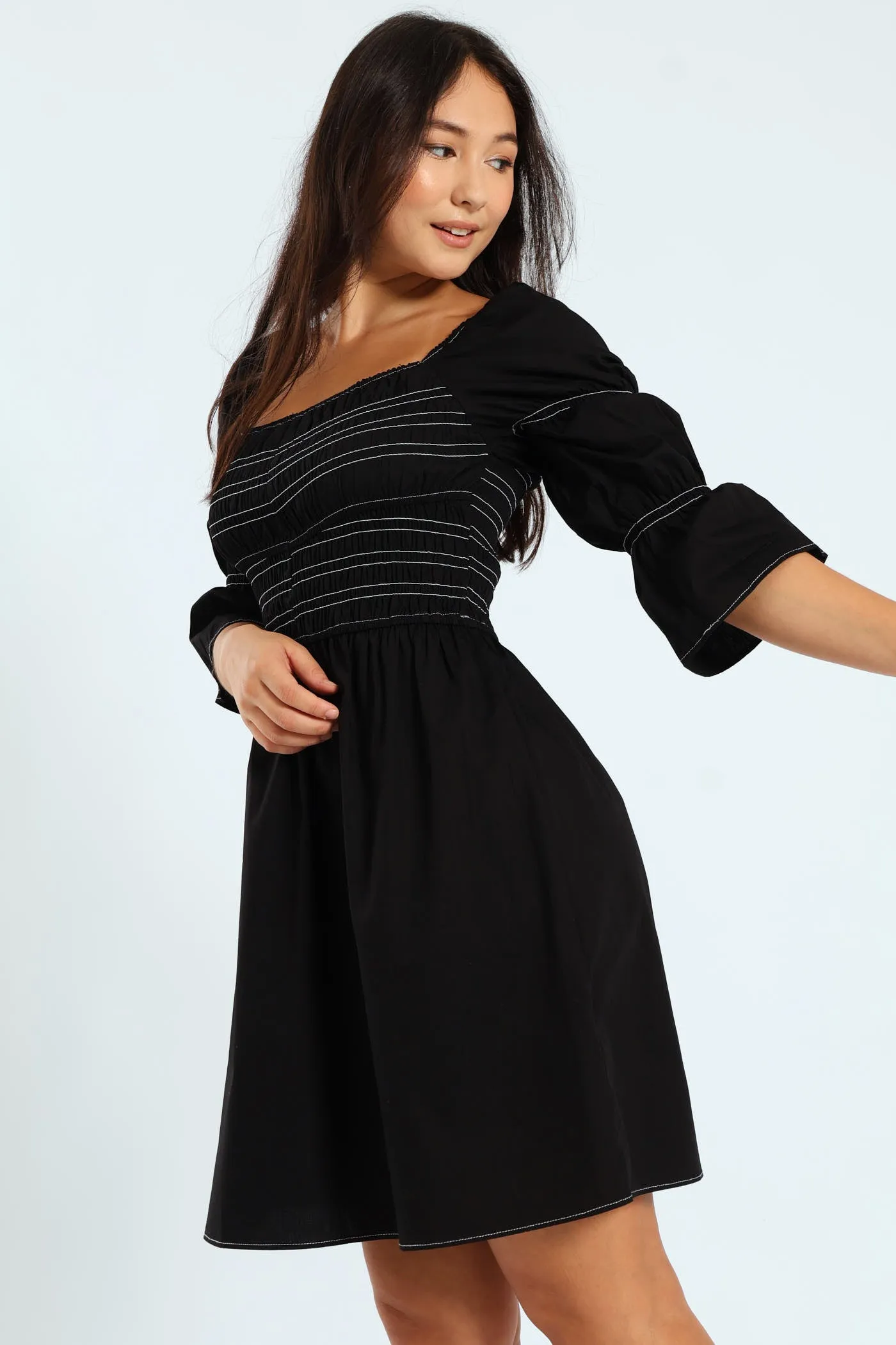 3/4 Center Stitch Smocked Mini Dress sold by Edgars