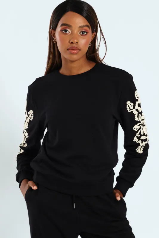 Floral Cornelli Long Sleeve Pullover - Black sold by Edgars 