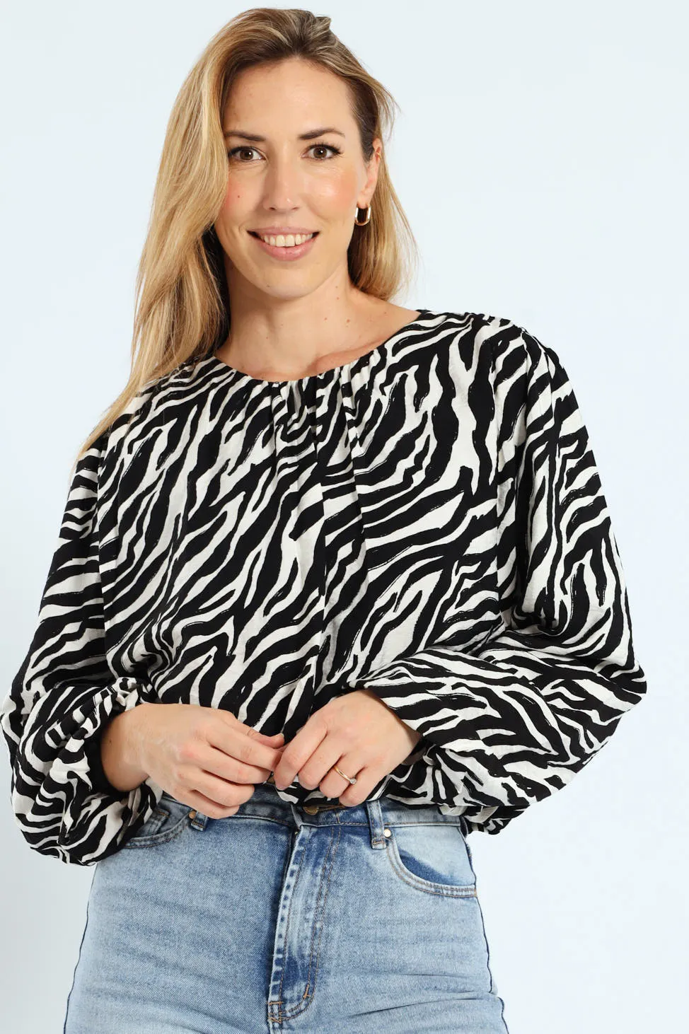 Zebra Puff Sleeve Bubble Hem Blouse - Cream/Black sold by Edgars