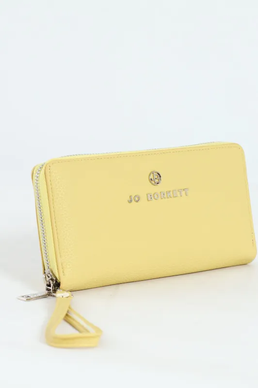 Nikki Pebble Zip Around With Hand Strap - Lemon sold by Edgars