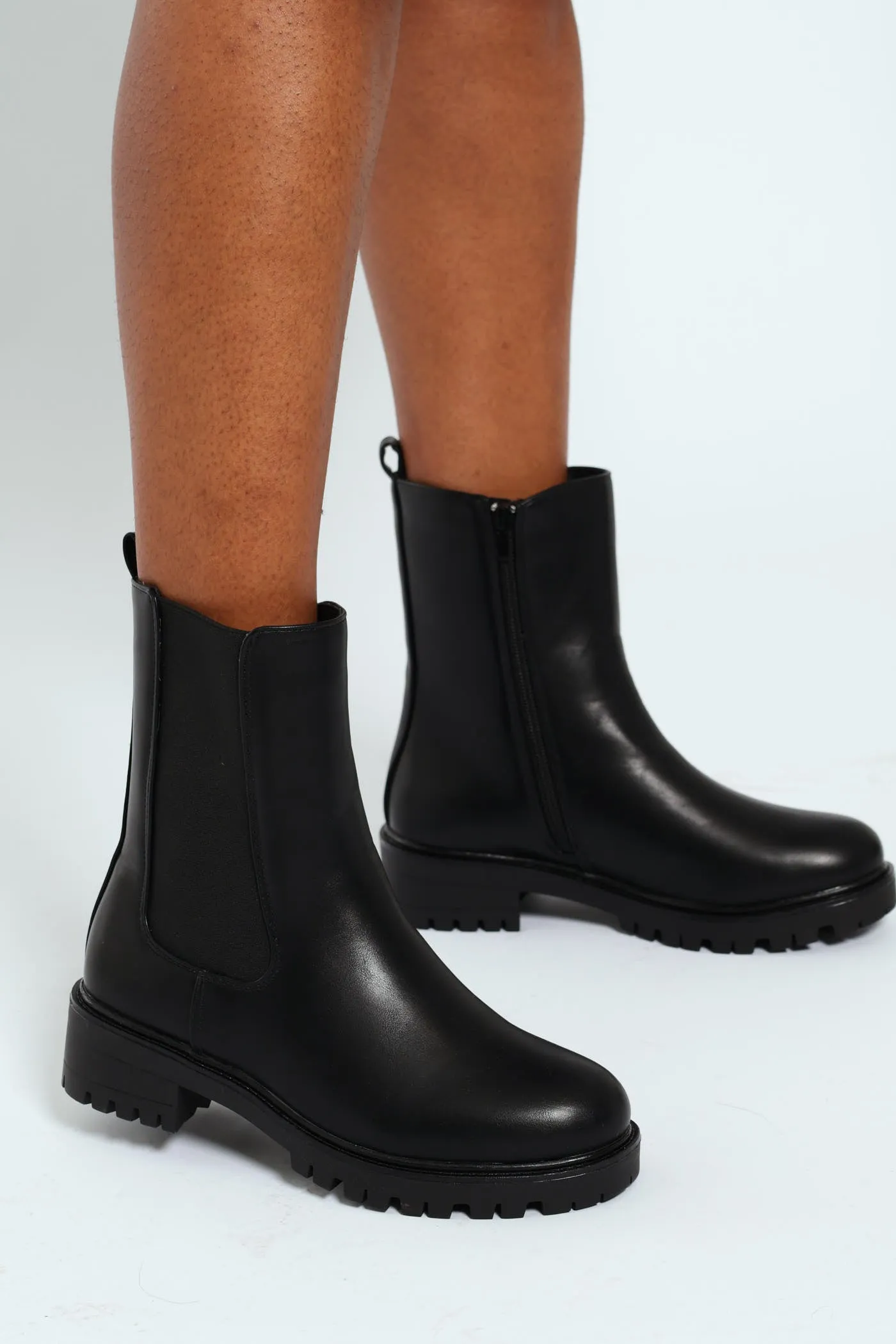 Chunky Cleated Boot - Black sold by Edgars