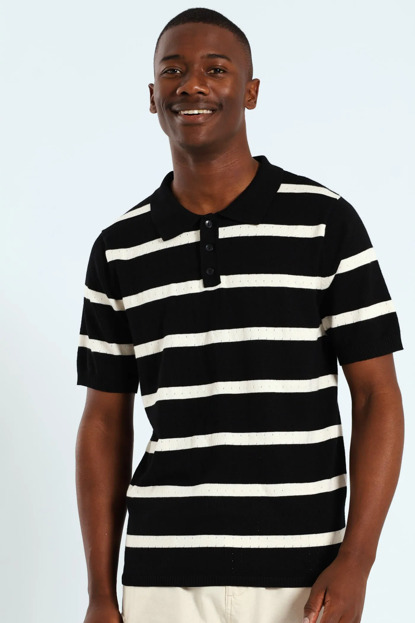 Waffle Stripe Fine Gauge Golfer - Black sold by Edgars