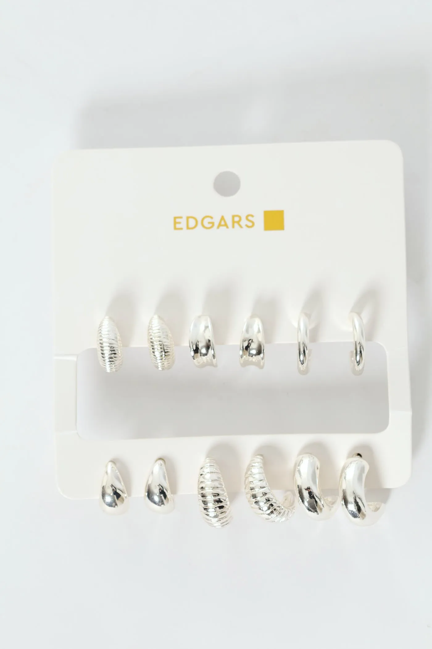 6 Pack Text Hoop Earrings - Silver sold by Edgars