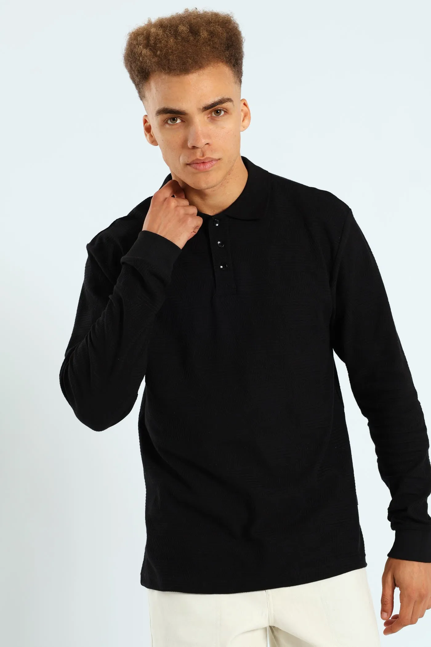 Long Sleeve Jacquard Golfer - Black sold by Edgars