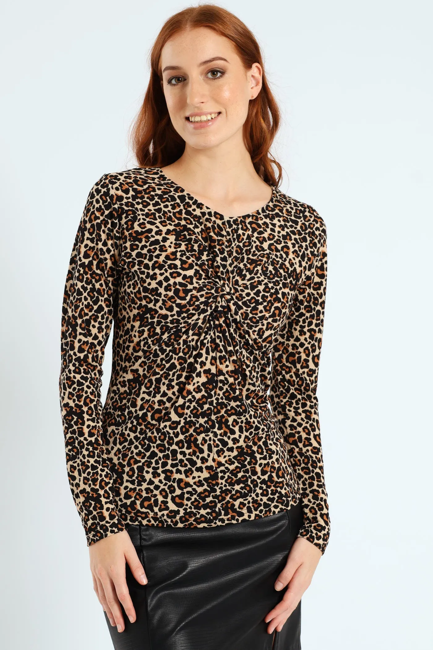 Long Sleeve Knot Front Rib Top - Animal Print sold by Edgars