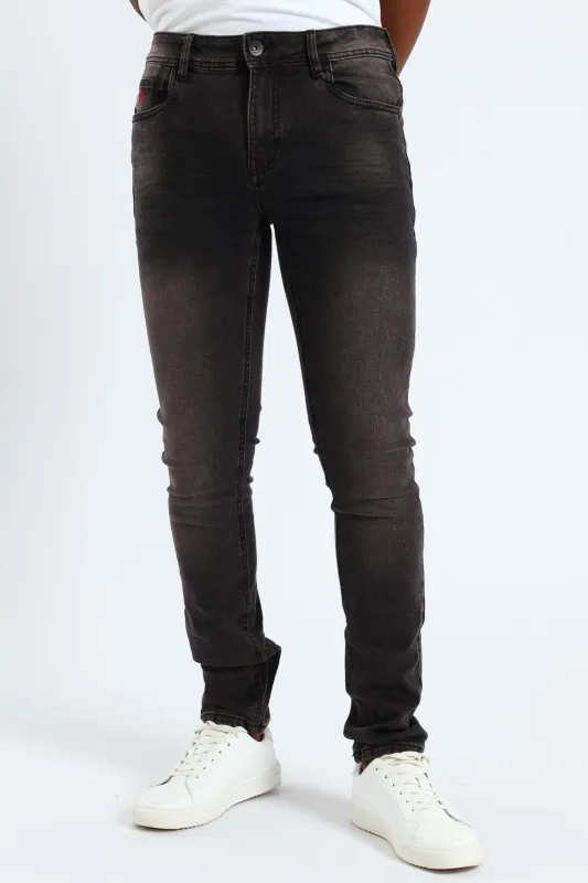 Cormac Skinny Denim - Charcoal sold by Edgars