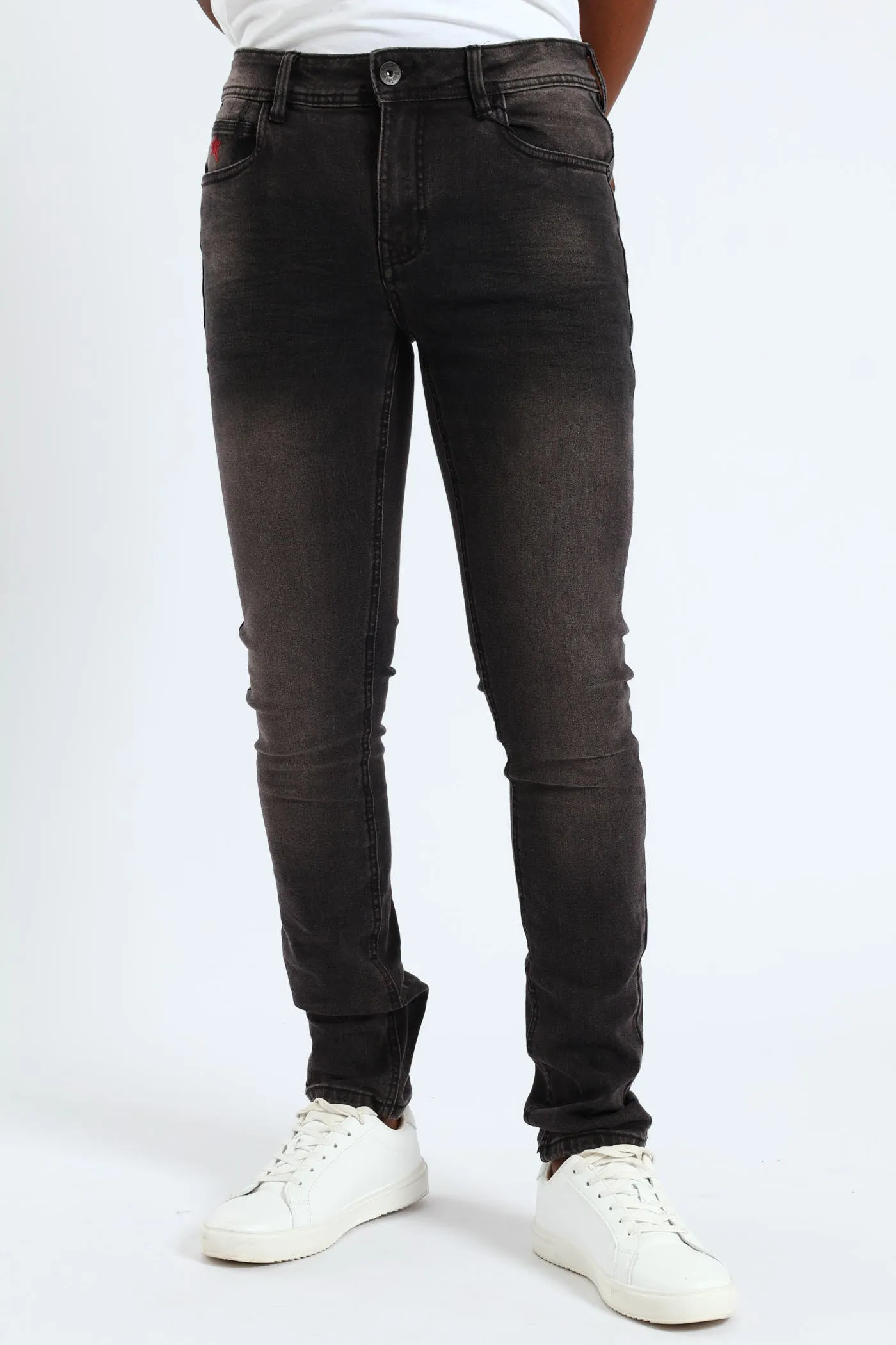 Cormac Skinny Denim - Charcoal sold by Edgars