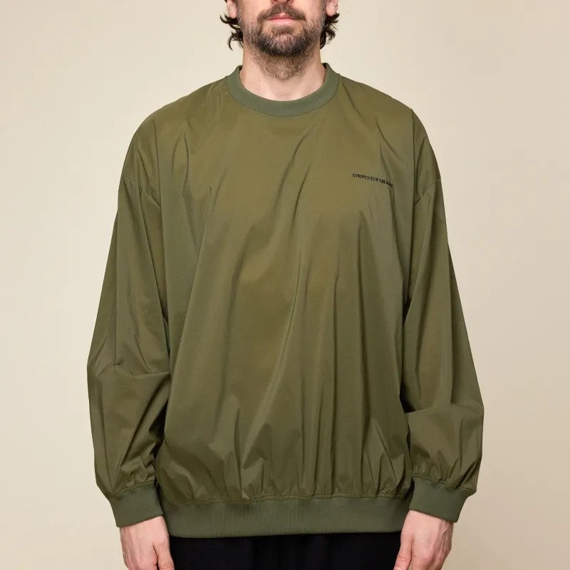 S.F.C Stripes For Creative - Nylon Crew Windbreaker Top - Olive made by This Thing Of Ours