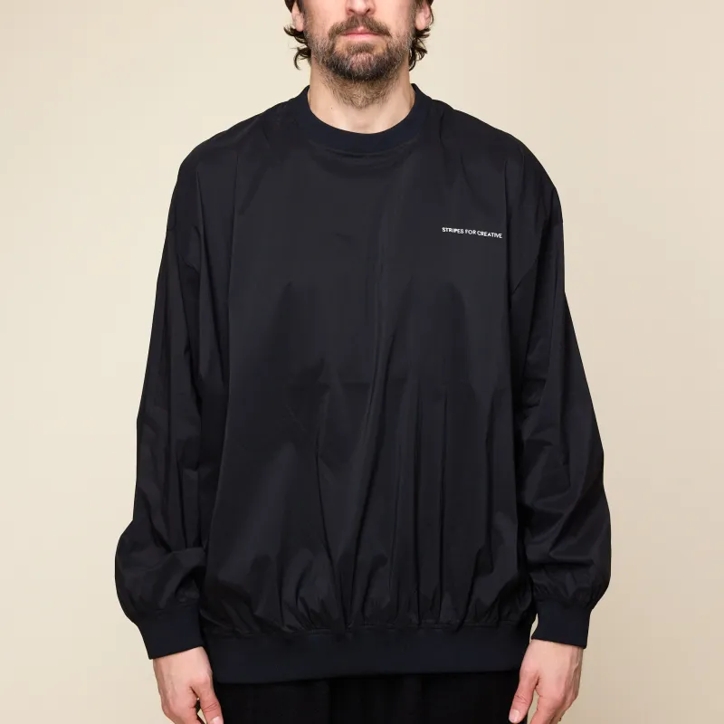 S.F.C Stripes For Creative - Nylon Crew Windbreaker Top - Black made by This Thing Of Ours