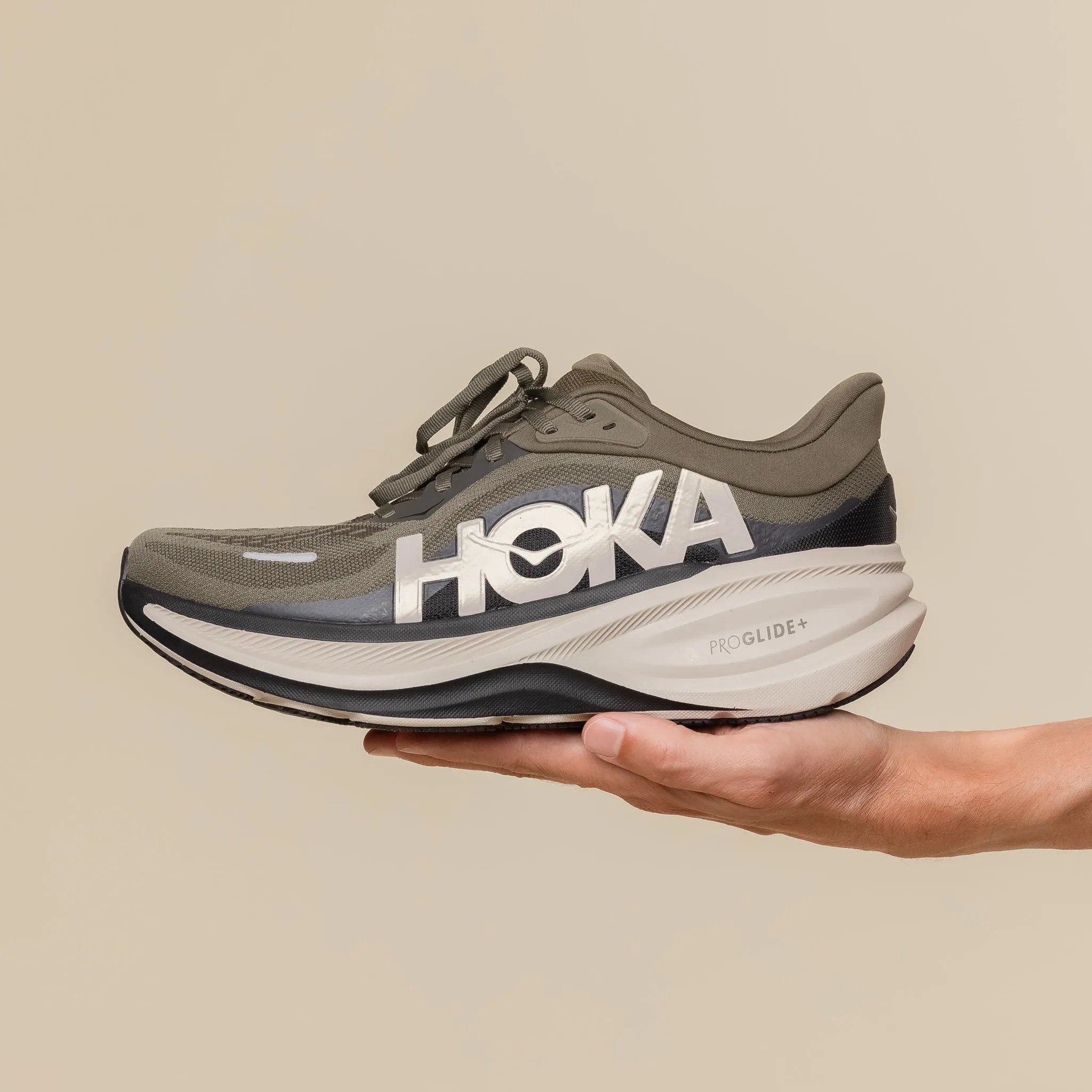 HOKA - Women's Clifton Pro - Antique Olive/River Rock Grey sold by This Thing Of Ours