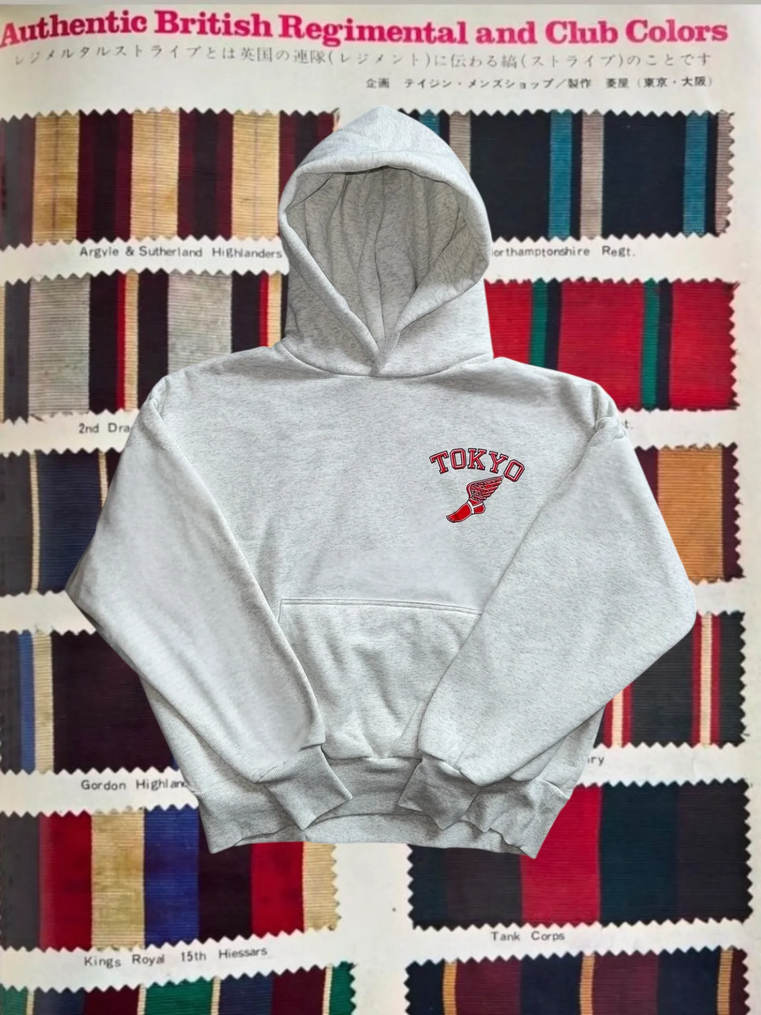 Winged foot hoodie (Grey) sold by Human by Nature