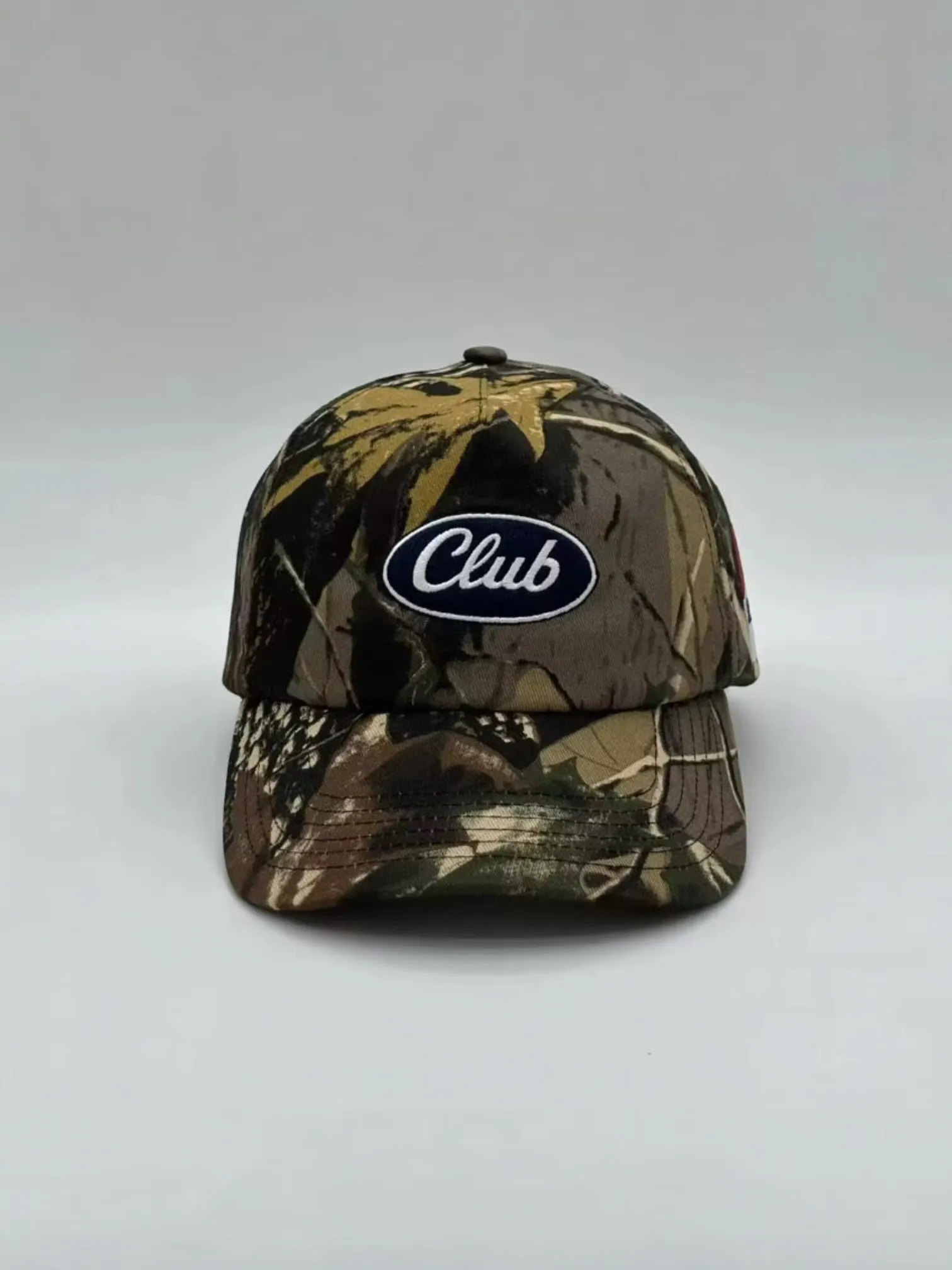 Hunting Camo Race Club Trucker sold by Human by Nature