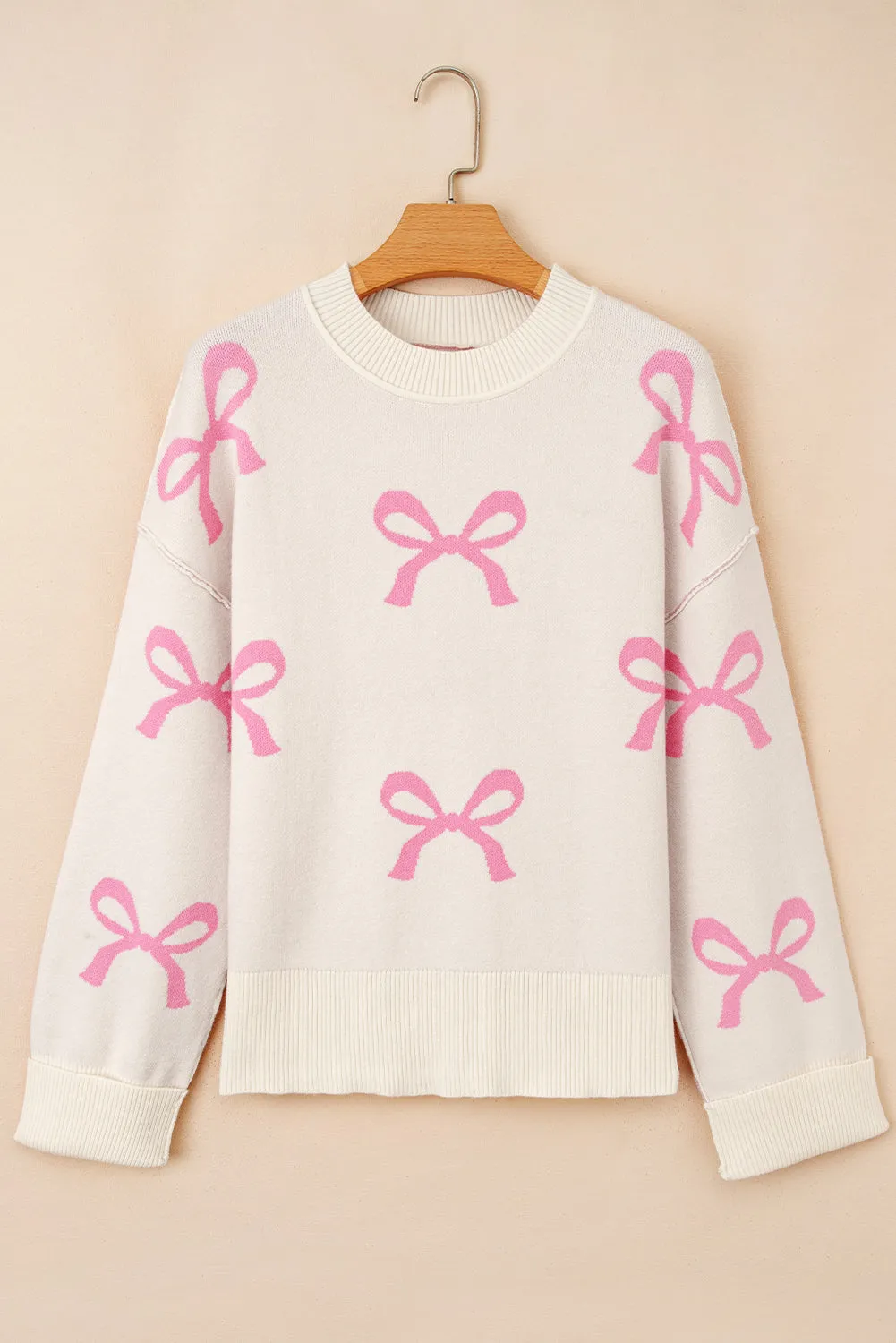 Pink Bow Print Ribbed Trim Exposed Seam Drop Shoulder Loose Sweater sold by eAura product image thumbnail 4