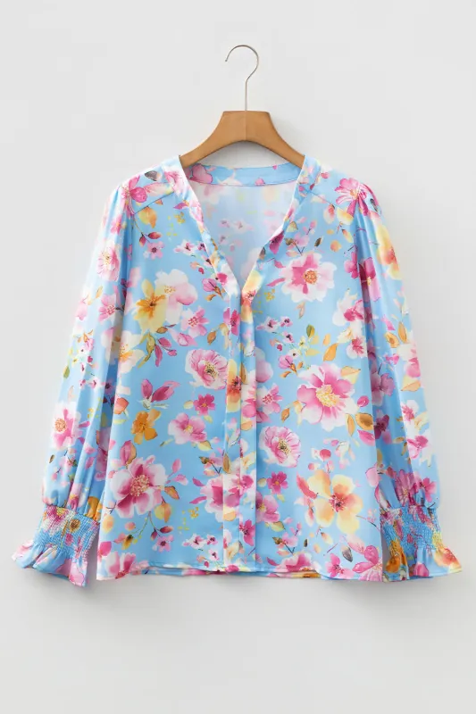 Sky Blue Floral Smocked Cuff Flounce Sleeve V-Neck Blouse sold by eAura