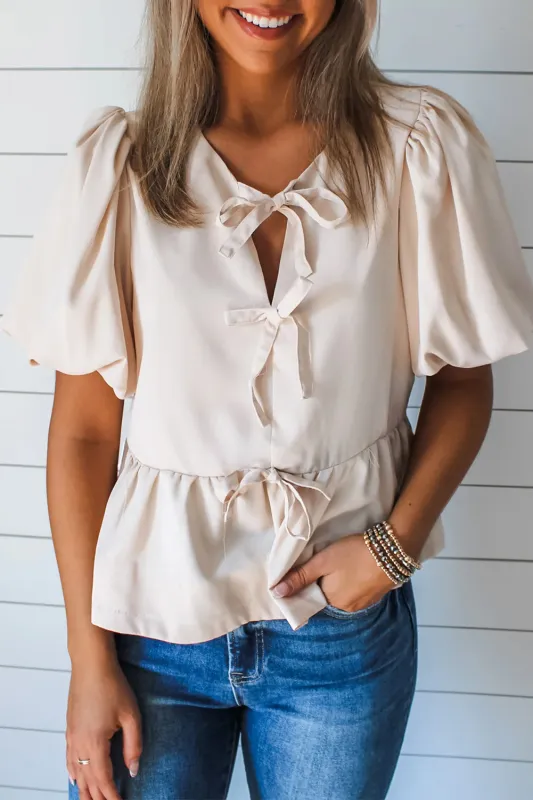 White Bow Tie Short Puff Sleeve Ruffle Hem Blouse sold by eAura