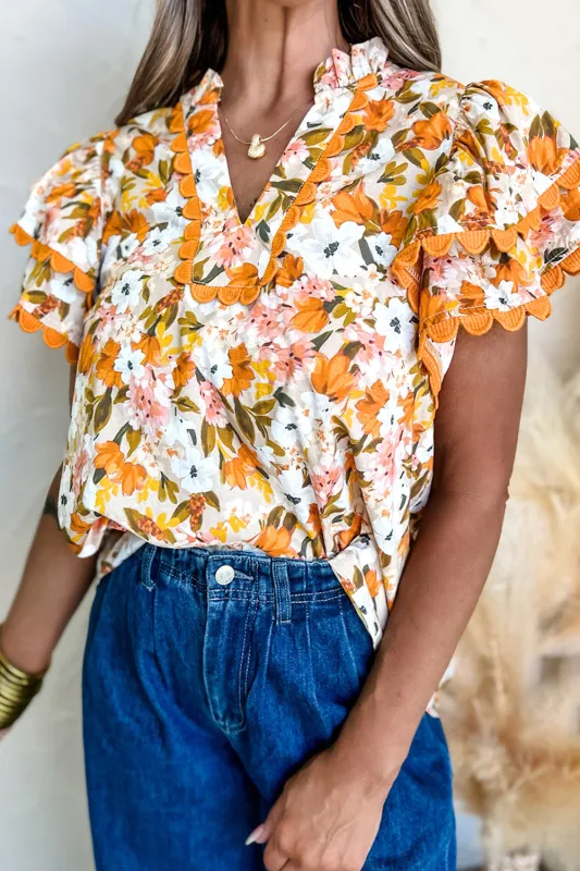 Russet Orange Ruffled V Neck Scalloped Short Sleeve Floral Blouse sold by eAura