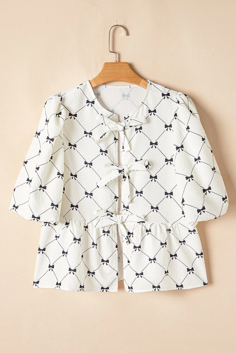 White Bowknot Print Front Knots Bubble Sleeve Blouse sold by eAura