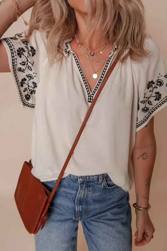 White Floral Embroidered Short Sleeve V Neck Blouse sold by eAura