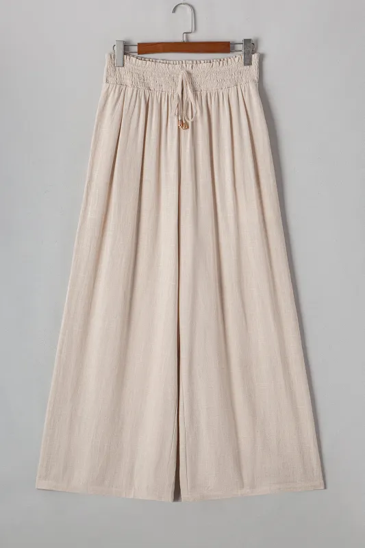 Beige Smocked High Waist Wide Leg Plus Size Trousers sold by eAura