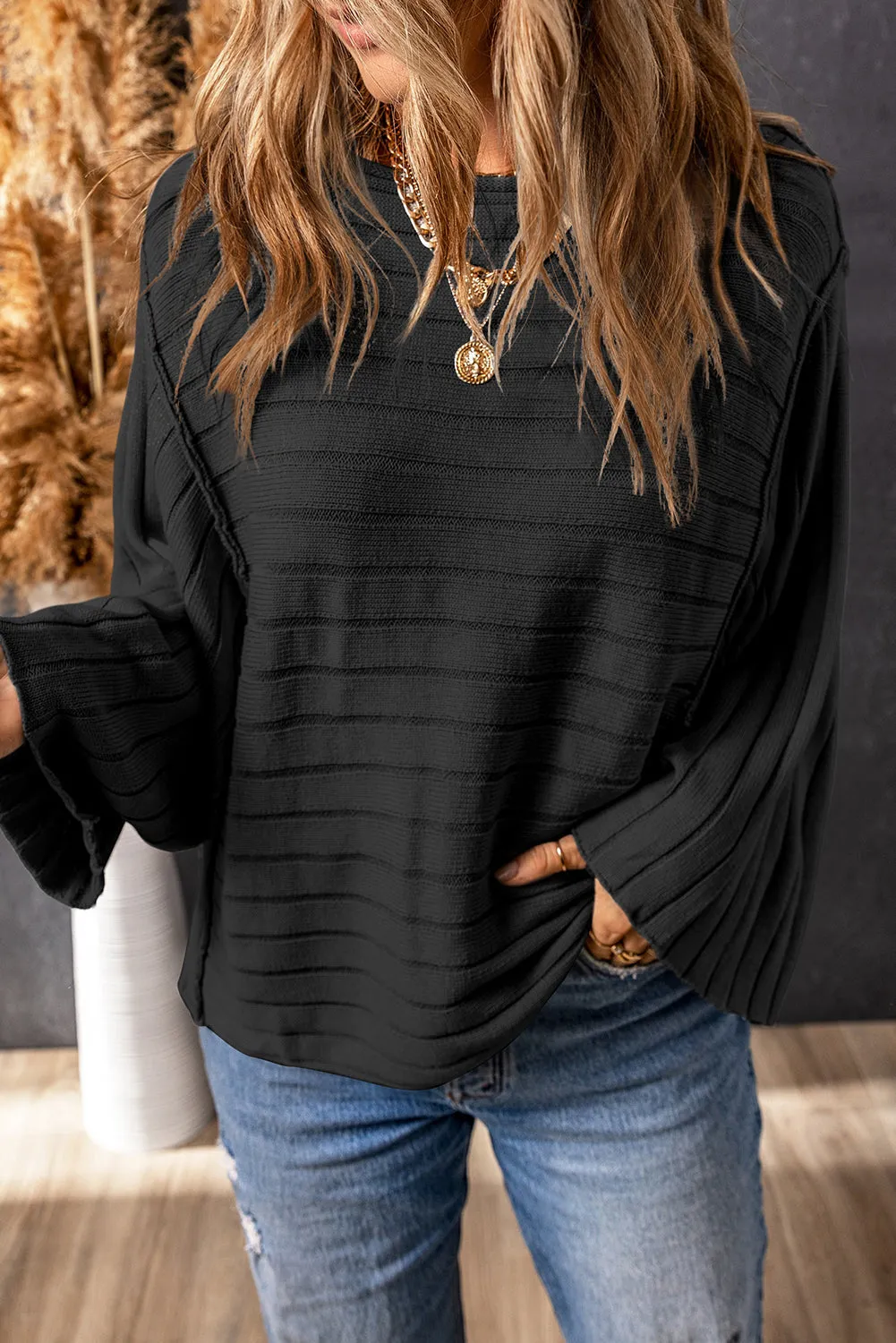 Black Exposed Seam Ribbed Knit Dolman Top sold by eAura