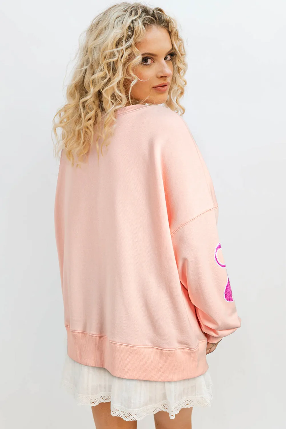 Apricot Pink Sequined Bowknot Drop Shoulder Oversized Sweatshirt sold by eAura product image thumbnail 2