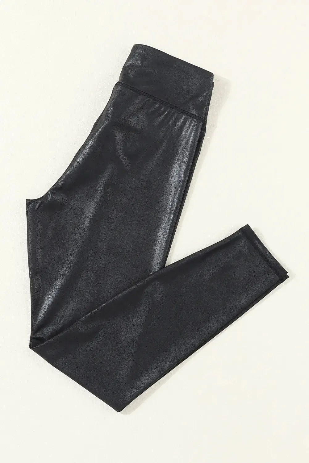 Black Crossed Dip Waist Sleek Leather Leggings sold by eAura
