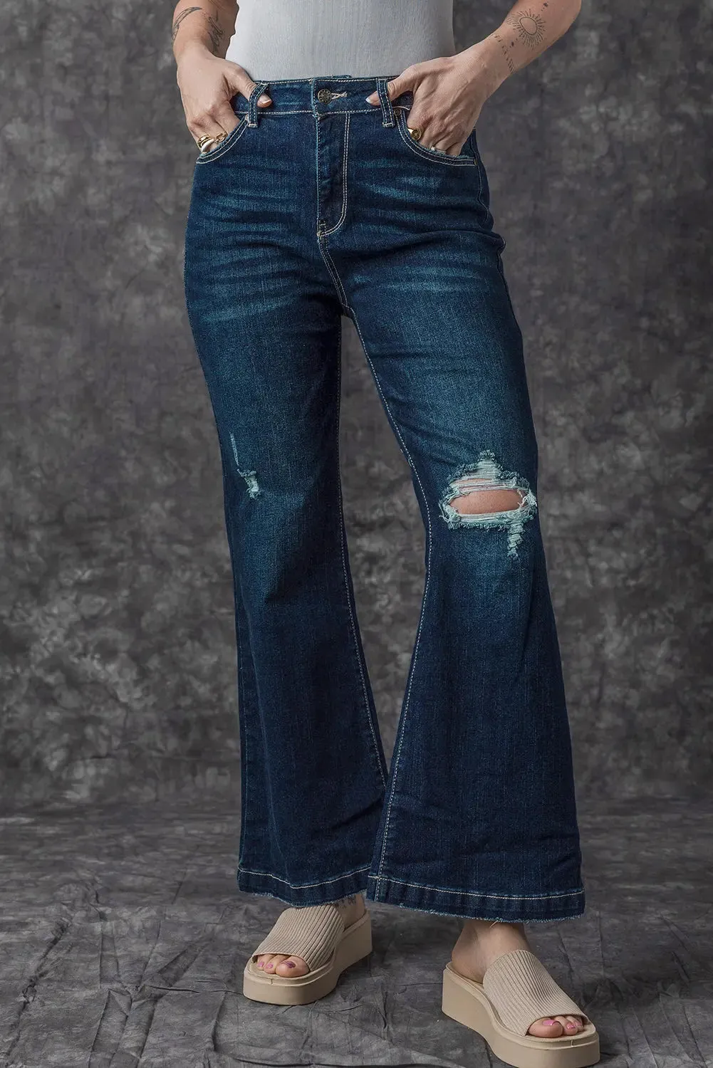 Real Teal High Rise Ripped Bell Bottom Jeans sold by eAura