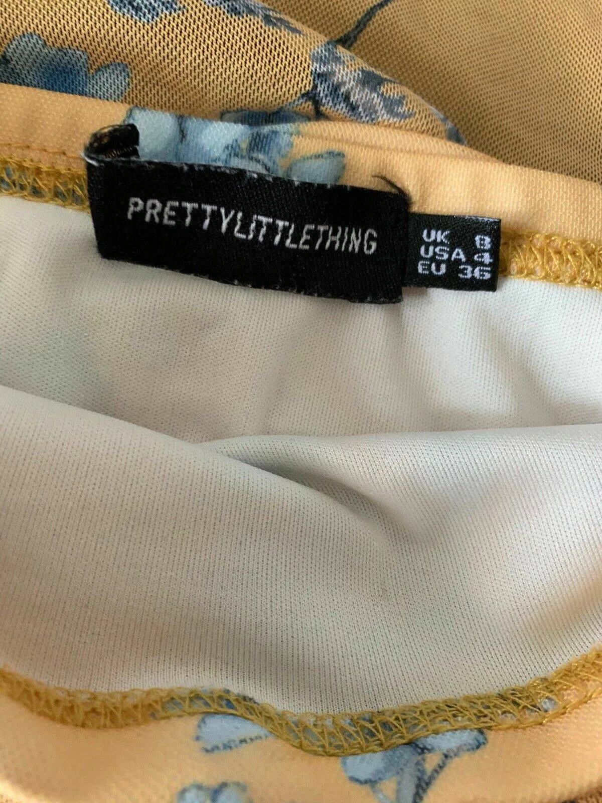 PrettyLittleThing Yellow Ditsy Floral Mesh Ruched Frill Edge Bandeau Bdoycon Dre sold by eAura product image thumbnail 5