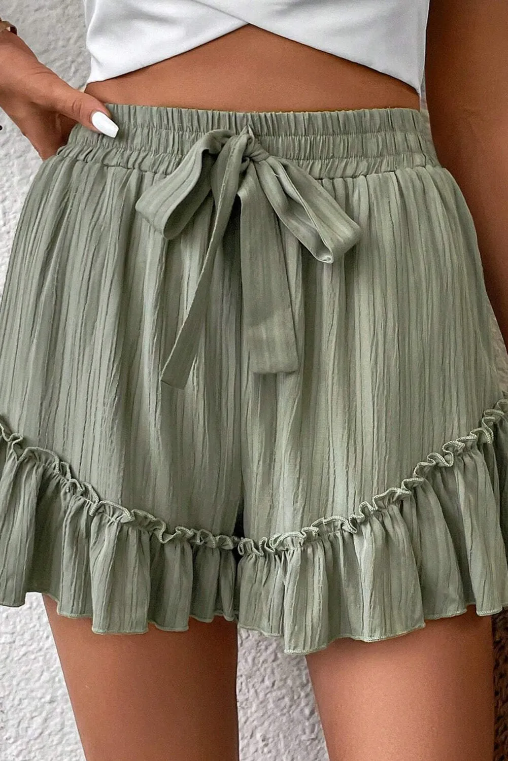 Laurel Green Textured Tie Waist Ruffle Hem Shorts sold by eAura product image thumbnail 5