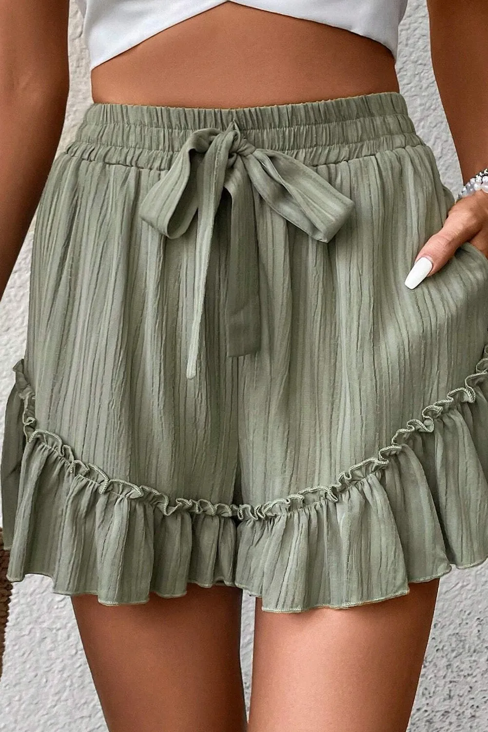 Laurel Green Textured Tie Waist Ruffle Hem Shorts sold by eAura product image thumbnail 4