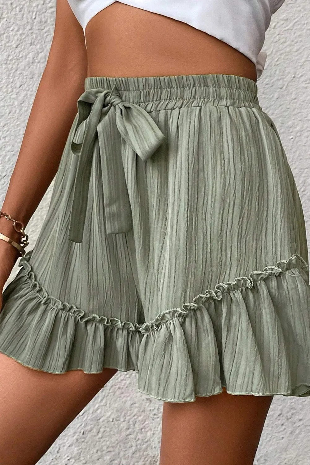 Laurel Green Textured Tie Waist Ruffle Hem Shorts sold by eAura product image thumbnail 3
